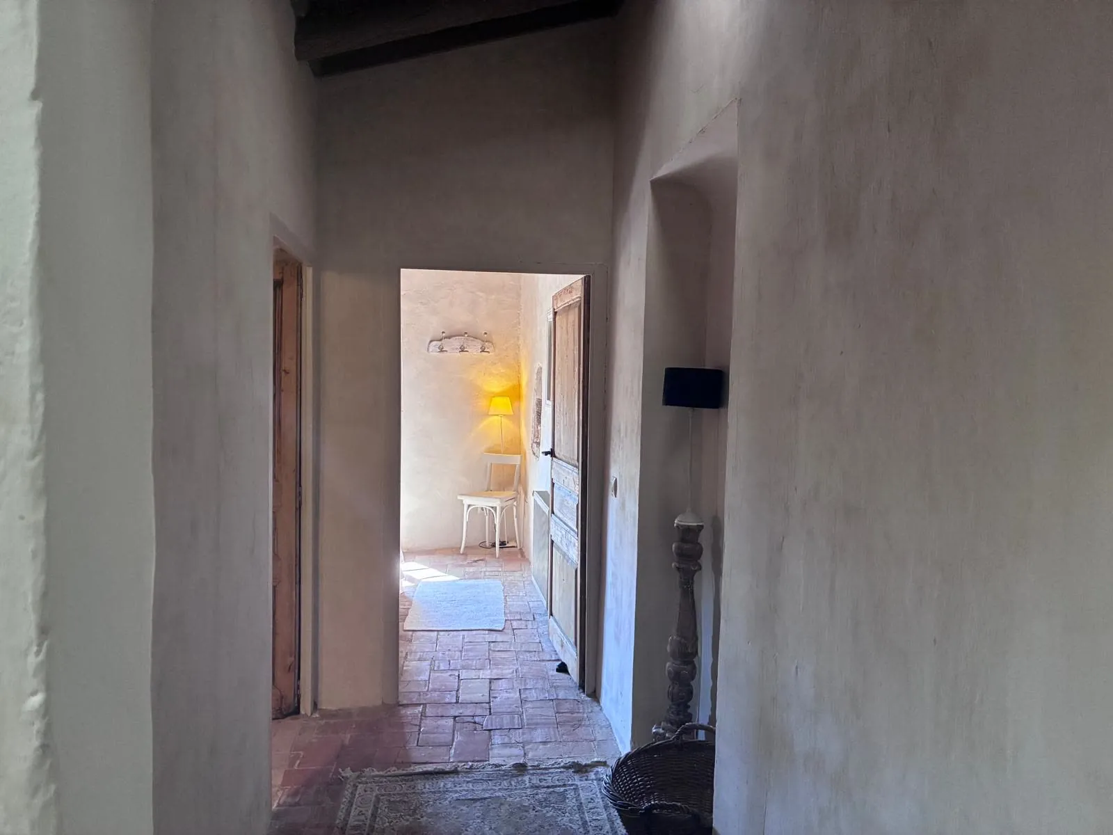 Hallway with terracotta floors