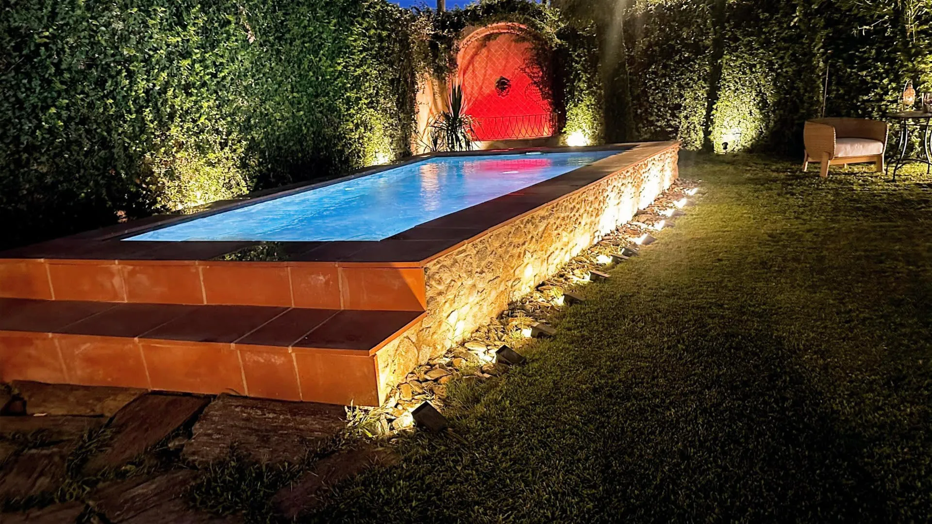 Pool lit up at night